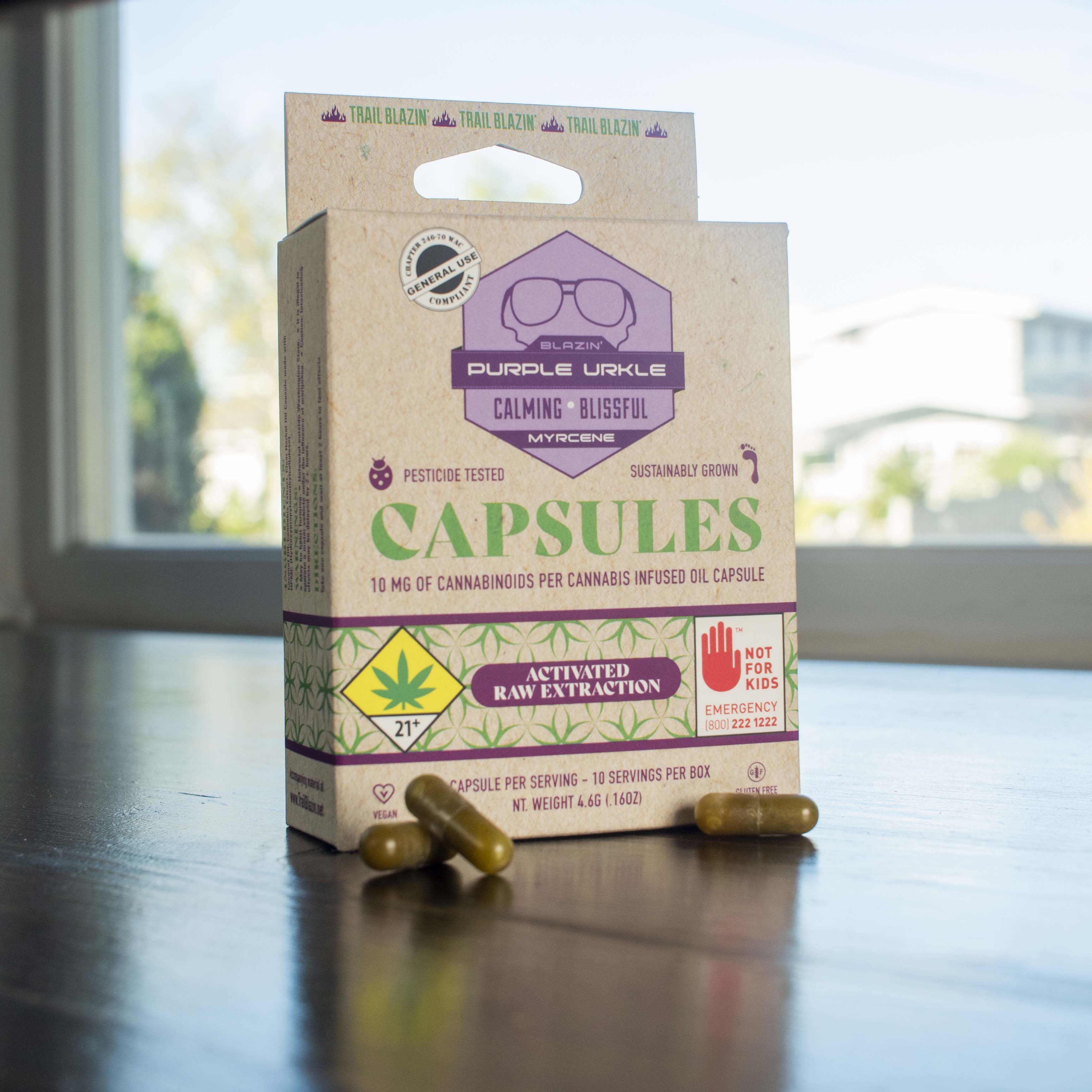 Purple Urkle capsule box with capsules.