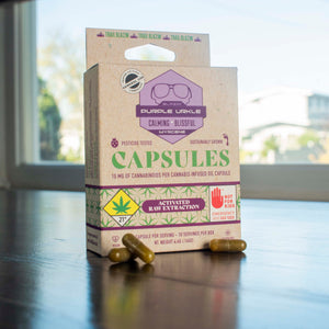 Purple Urkle capsule box with capsules.