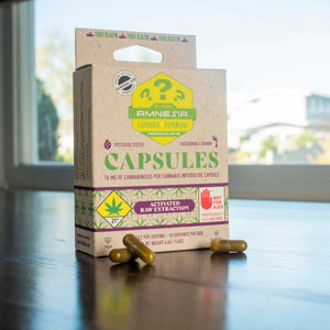 Amnesia capsule box with capsules.