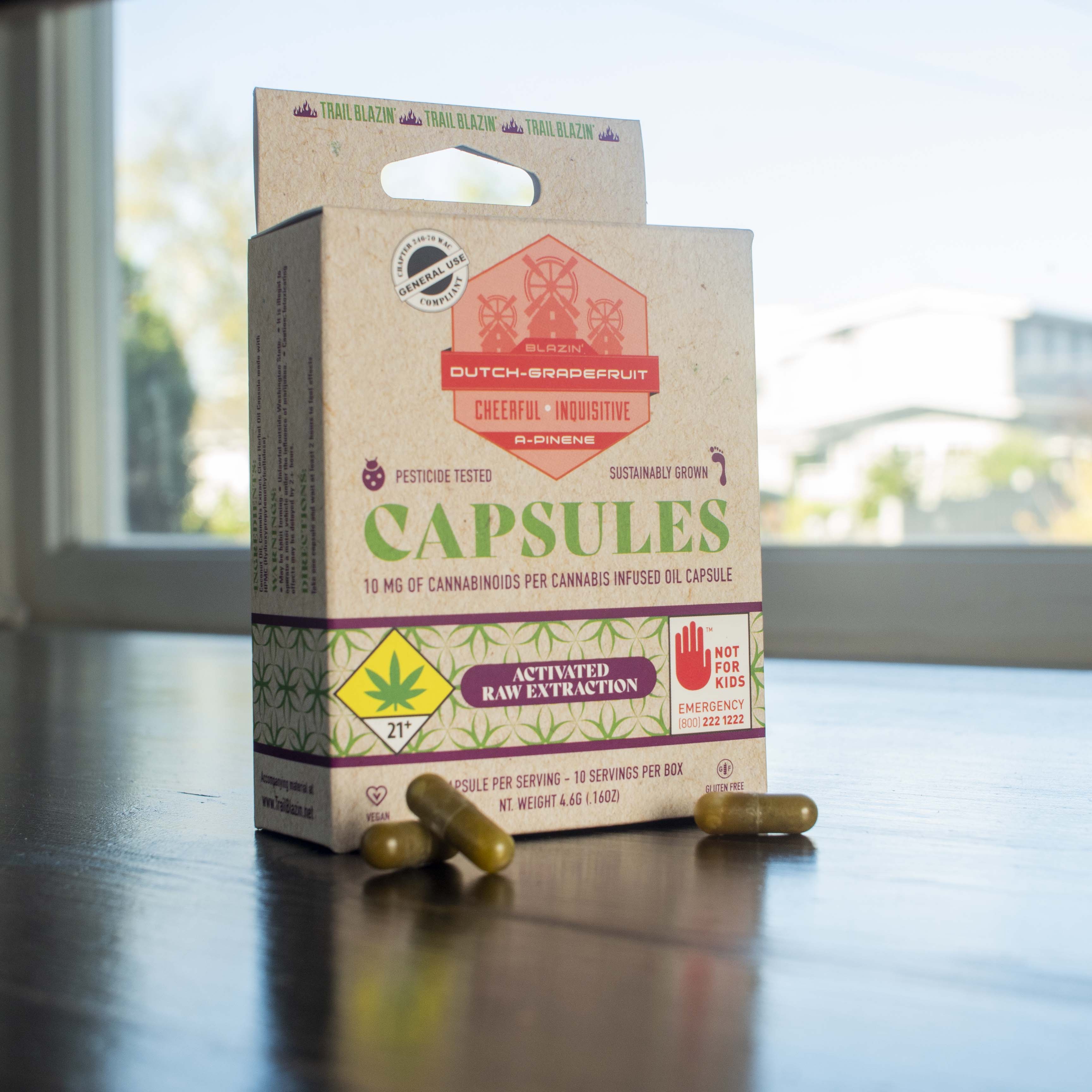 Dutch Grapefruit capsule box with capsules.
